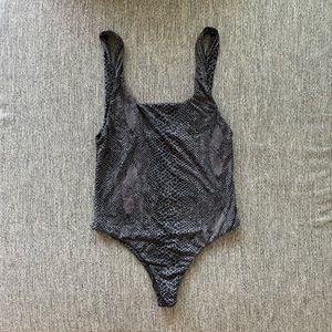 Acacia River one piece in black snake lining